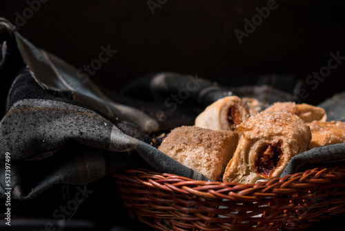 Sweet colombian traditional food with sugar on black wooden table	