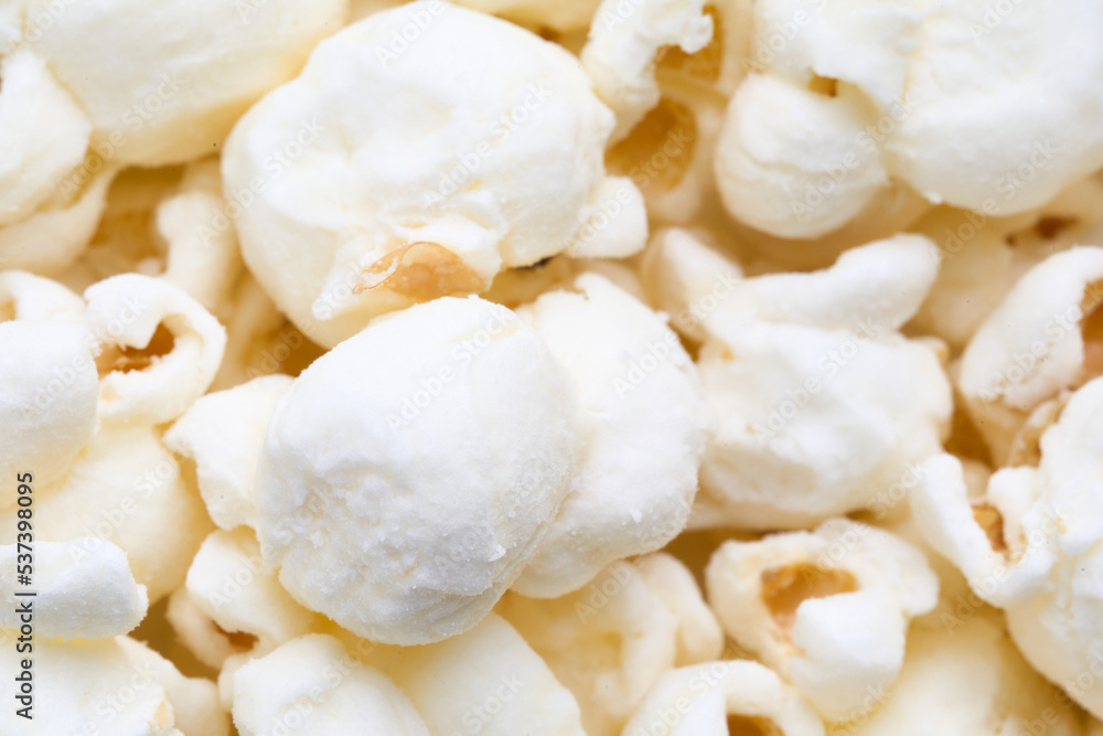 close up of popcorn isolated on white