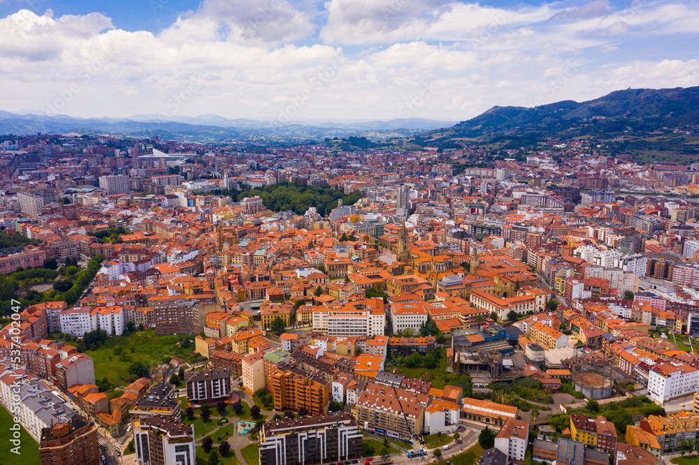 View from drone of Oviedo city, with landscape and buildings, Asturias, Spain
