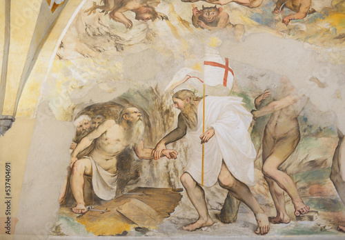 Mural picturing Christ redeems Adam from the underworld as described in an apocryphal work by Nicodemus in the Sistine Chapel of the poor at Lake Iseo in Italy photo