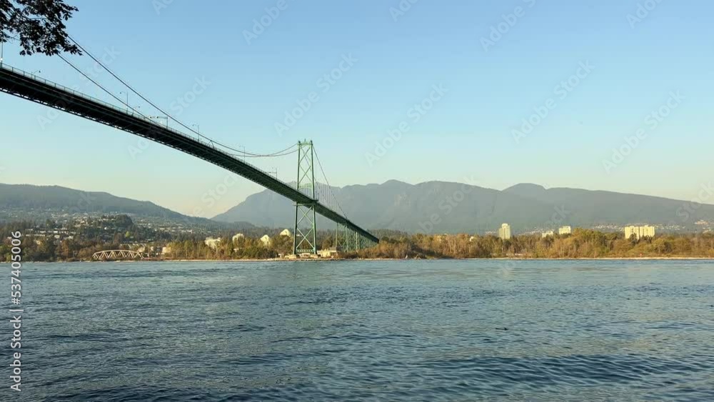 Bridge Pillar Stanley Park Vancouver Canada view of the bridge from under the bridge you can see the columns and also up the bridges Bridge in the Pacific Ocean the camera slowly floats filming it Bridge Pillar Stanley Park Vancouver Canada view of the bridge from under the bridge you can see the columns and also up the bridges Bridge in the Pacific Ocean the camera slowly floats filming it