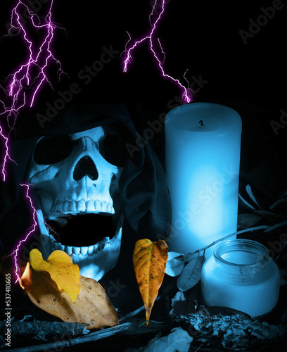 , surrounded by dead leaves and unlit candles. Digital lightning is added for artistic effect