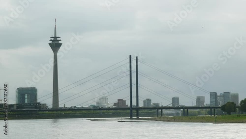 Cityscape of Düsseldorf, Germany with Rheinturn and bridge over the river rhein