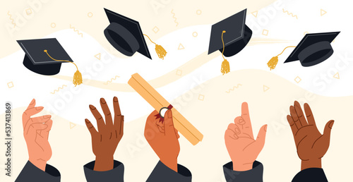 People tossing graduation caps
