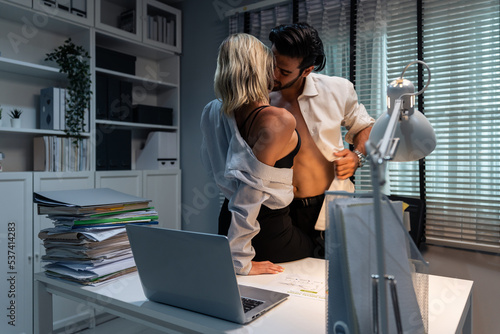 Obraz na płótnie Caucasian businessman and woman foreplay and making love in the office