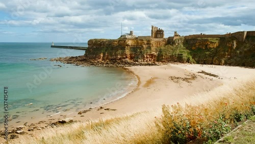 Establishing shot of the Tynemouth Priory and Castle, once one of the largest fortified areas in Northumberland, England, UK photo