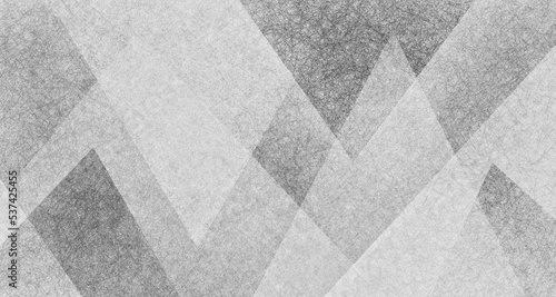 Abstract black and white background, modern art design of triangle shapes layered in random geometric pattern, abstract texture and white gray and black monochrome color design