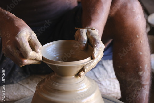 9 October 2022, Pune, India, Indian potter making Diya (oil lamps) or earthen lamps for Diwali Festival with clay, Handwork craft.