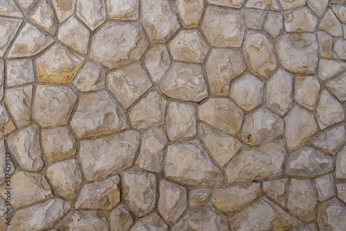 Stone wall, interestingly textured natural stone wall. Copy space for your design or product. Web banner.