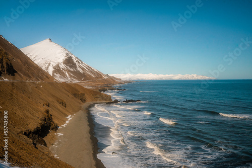 Laekjavik , Beautiful coast and rocks around Atlantic ocean during winter sunny day near Djúpivogur , Peninsula near Austurland East of Iceland : 19 March 2020 photo