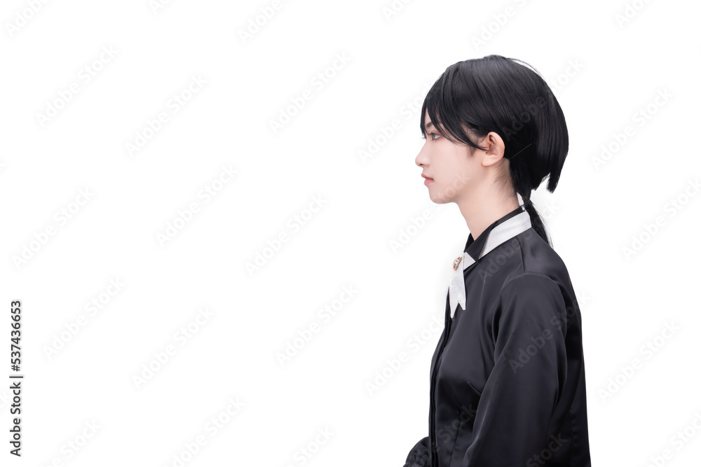 A girl dressed in black against a white background A girl dressed in black against a white background