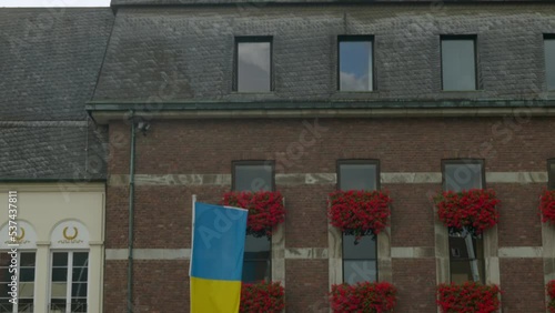 Town hall of Düsseldorf, Germany with Ukrainian Flag 