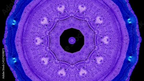 Abstract purple kaleidoscope paint ink patterns. Mandala Kaleidoscopic Design. Geometric background