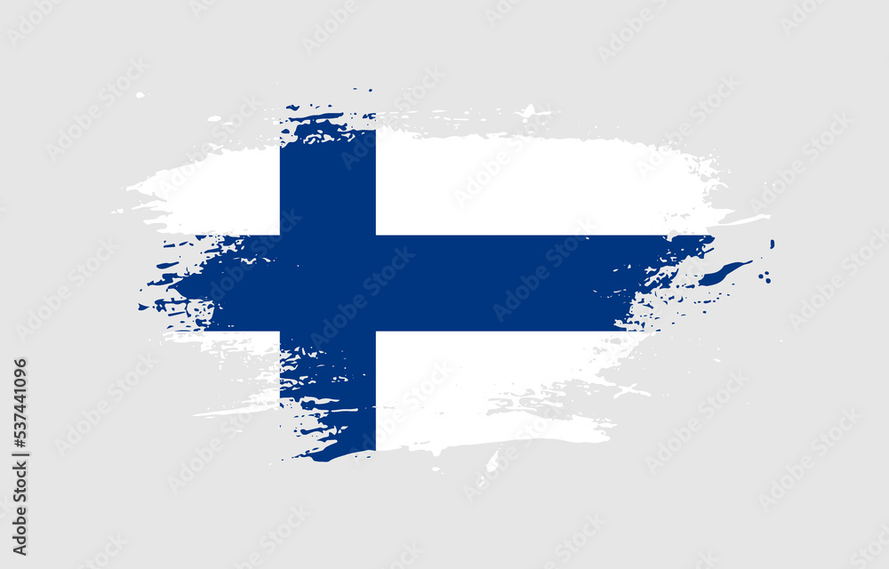 Grunge brush stroke with the national flag of Finland on a white ...