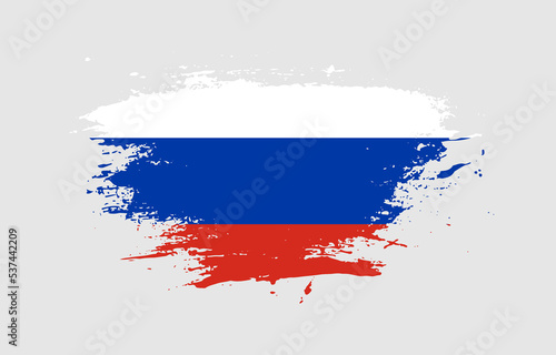 Grunge brush stroke with the national flag of Russia on a white isolated background