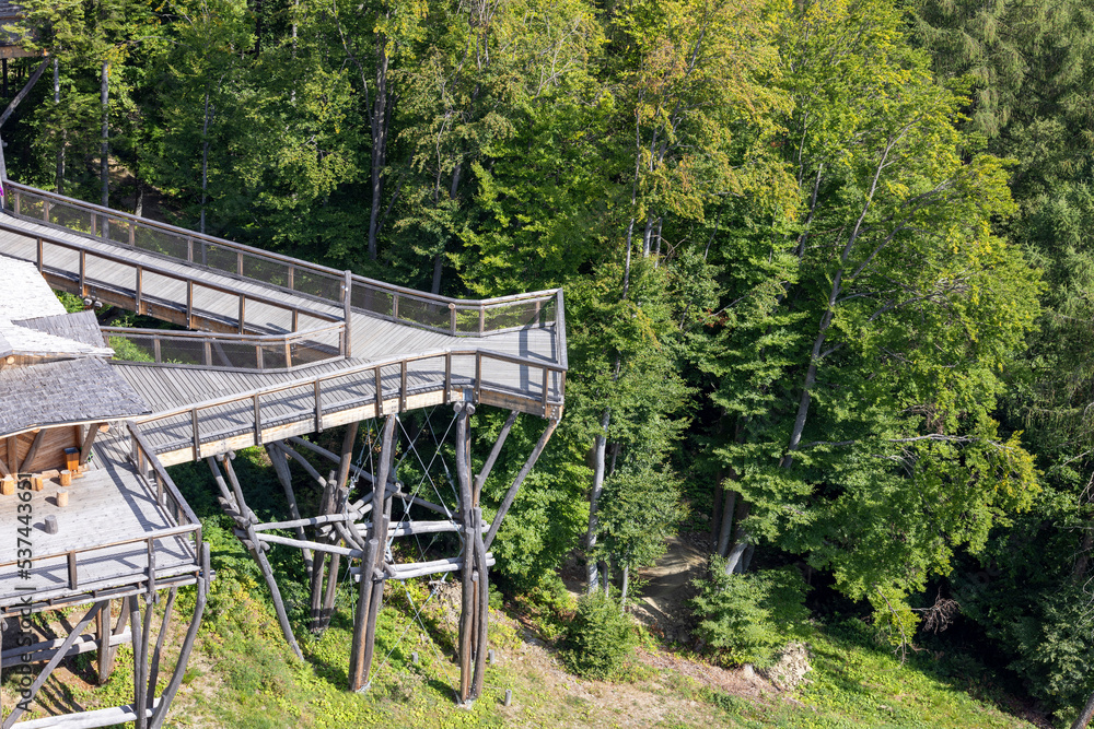 Observation tower located at the top of the Slotwiny Arena ski station, leading in the treetops, Krynica Zdroj, Beskid Mountains, Slotwiny, Poland Observation tower located at the top of the Slotwiny Arena ski station, leading in the treetops, Krynica Zdroj, Beskid Mountains, Slotwiny, Poland