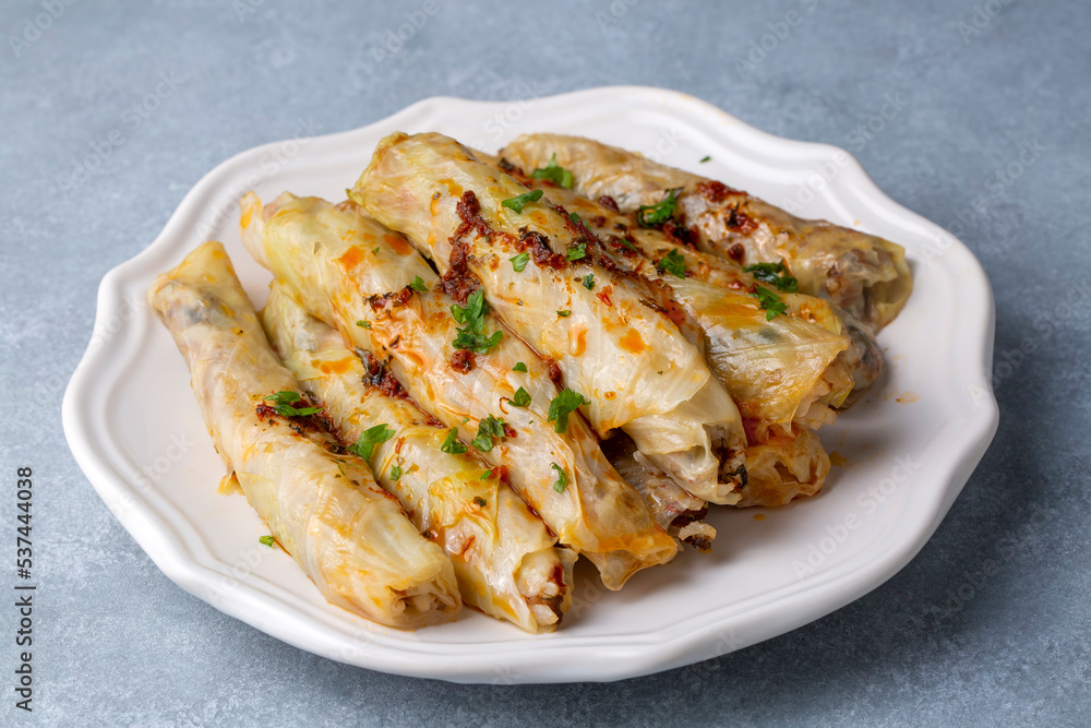 Lahana Sarma - Lahana sarmasi, Turkish traditional food,a boiled cabbage leaf that is formed into a roll with a stuffing of rice Lahana Sarma - Lahana sarmasi, Turkish traditional food,a boiled cabbage leaf that is formed into a roll with a stuffing of rice
