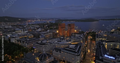 Oslo Norway v55 cinematic low level drone flyover rådhuset city town hall, capturing illuminated downtown night cityscape and waterfront harbor view - Shot with Mavic 3 Cine - June 2022 photo