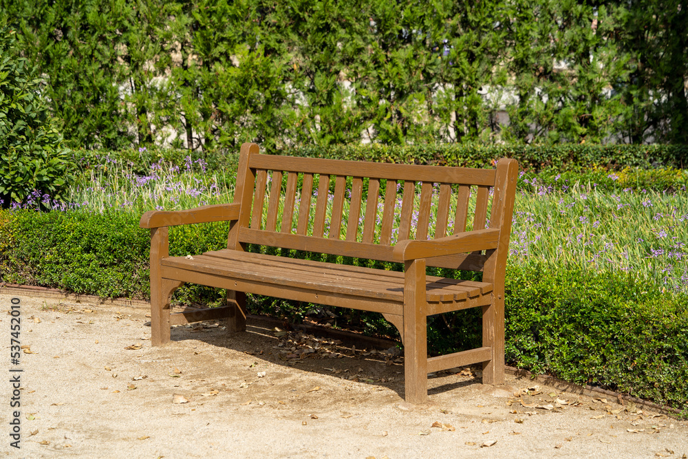 Bench without people, in a garden in Barcelona (Spain) Bench without people, in a garden in Barcelona (Spain)