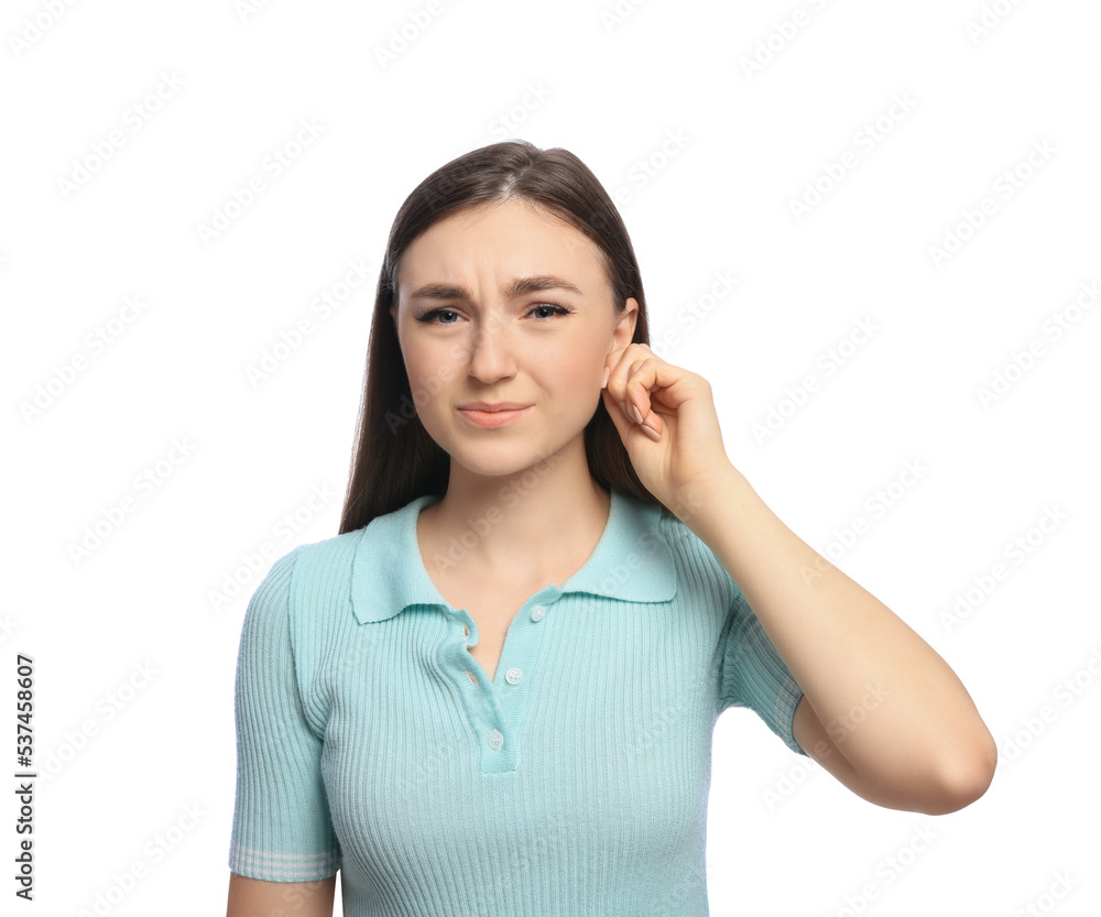 Young woman suffering from ear pain on white background Young woman suffering from ear pain on white background