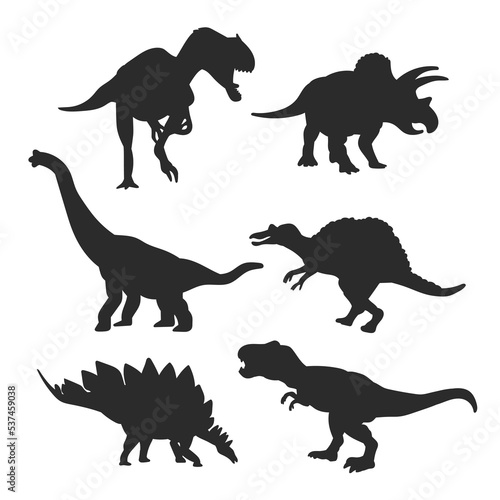 Set silhouettes of dinosaurs. Vector illustration group
