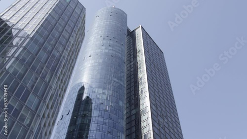 Low angle shot of modern glass skyscrappers in Frankurt city, Germnay photo