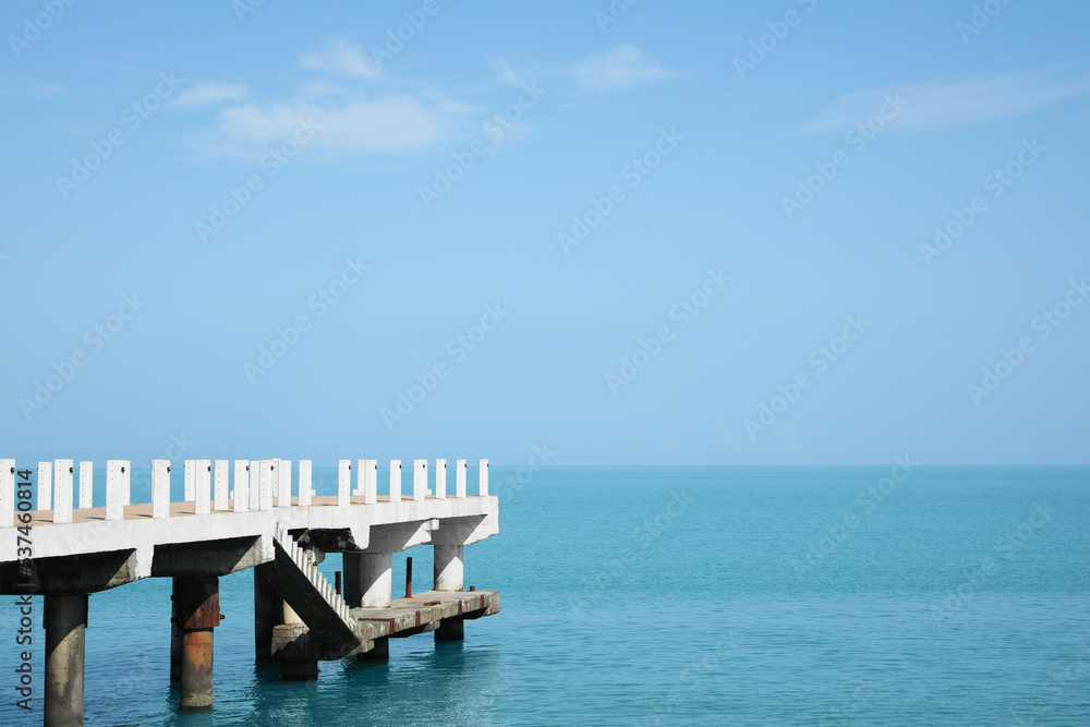 Beautiful white pier in sea on sunny day, space for text