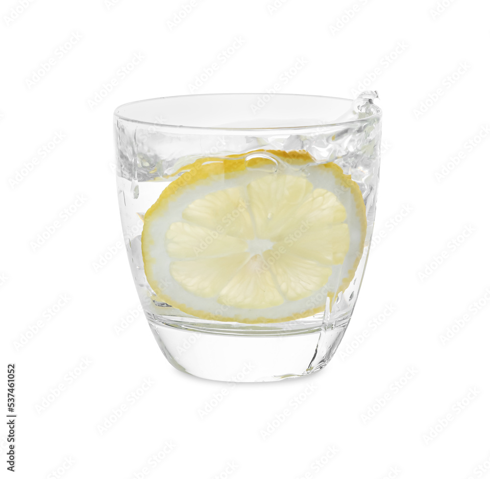 Water with sliced lemon splashing out of glass on white background Water with sliced lemon splashing out of glass on white background