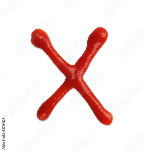 Letter X written with ketchup on white background