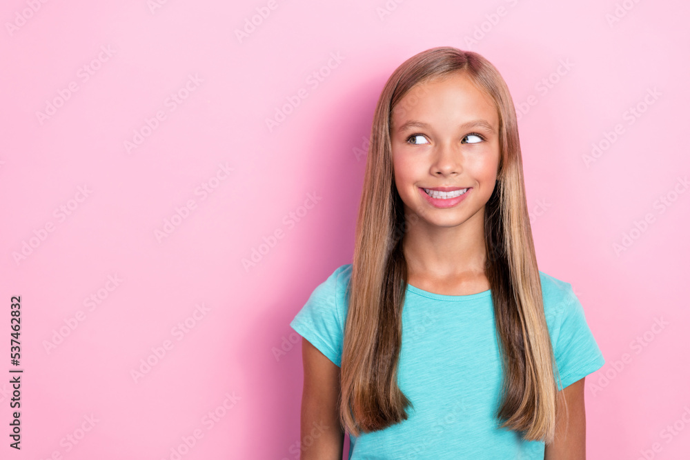 Closeup photo of cute pretty schoolgirl beautiful long blonde hair toothy smiling dreamy interested empty space shopping isolated on pink color background Closeup photo of cute pretty schoolgirl beautiful long blonde hair toothy smiling dreamy interested empty space shopping isolated on pink color background