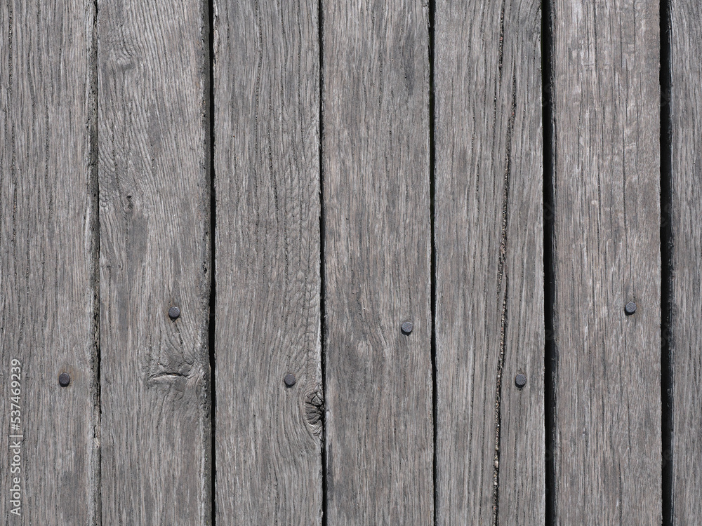 Naklejka premium Wooden deck of an old bridge. Klaipeda, Lithuania.