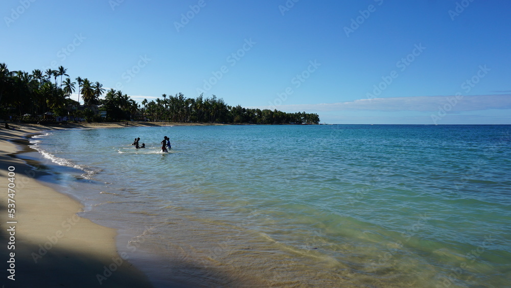 people on the Playa Las Terrenas in the province of the Samana Peninsula in the Dominican Republic in the month of January 2022