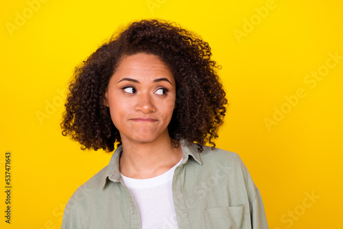 Portrait of pretty nice lady marketer looking away empty space isolated on bright vivid color background