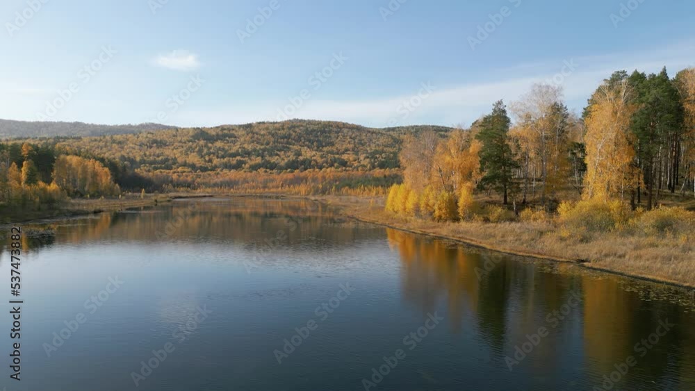 Beautiful autumn lake and forest. Walk in the forest with autumn trees. Yellow leaves. Canadian maple. Nature in autumn. Reflection of autumn trees in the water. Beautiful autumn lake and forest. Walk in the forest with autumn trees. Yellow leaves. Canadian maple. Nature in autumn. Reflection of autumn trees in the water.