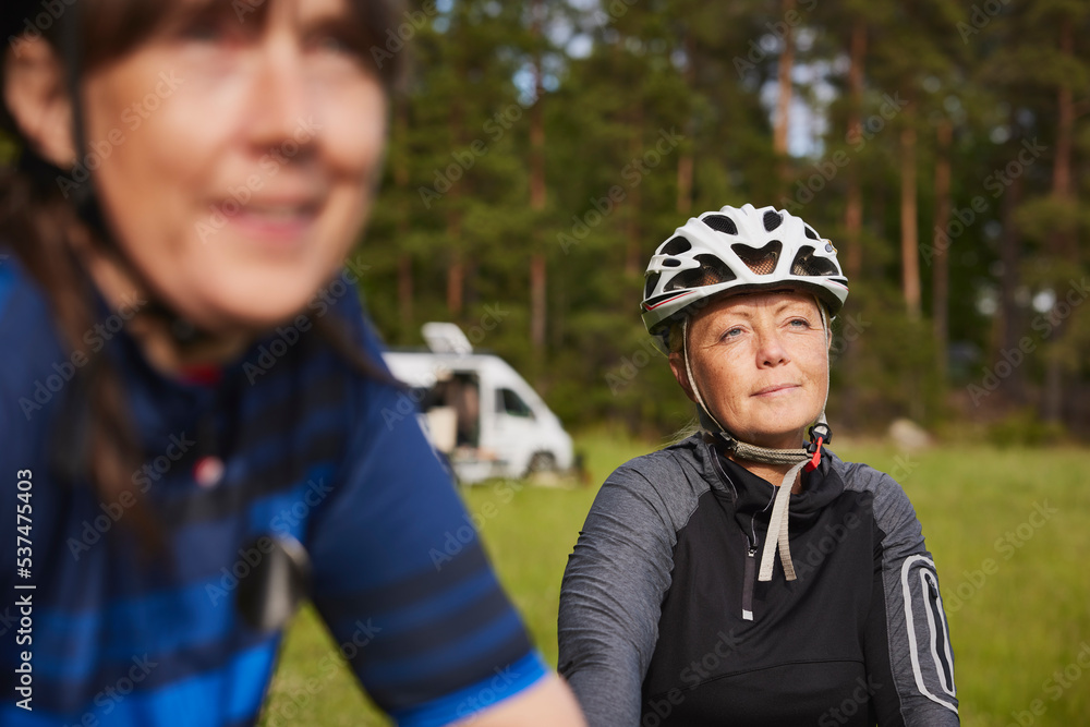 Female friends on cycling trip Female friends on cycling trip