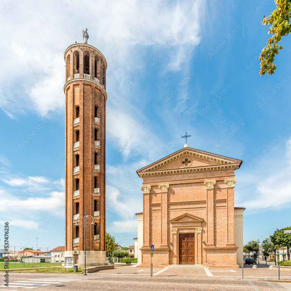 View at the Church of Saint Michael Archangel with round Bell tower in Quarto d Altino, Italy