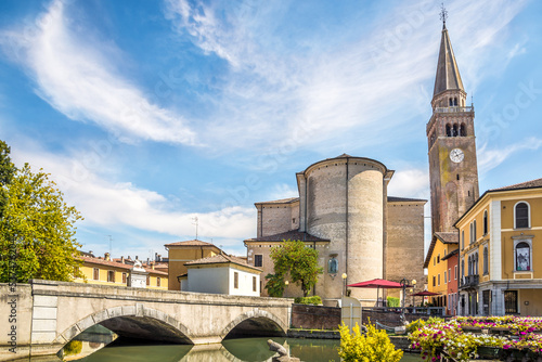 Photos View at the Church of Saint Andrew with bridge over Lemene river in Portogruaro,