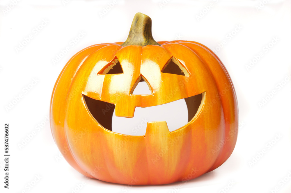 carved ceramic pumpkin for Halloween holidays, isolated carved ceramic pumpkin for Halloween holidays, isolated