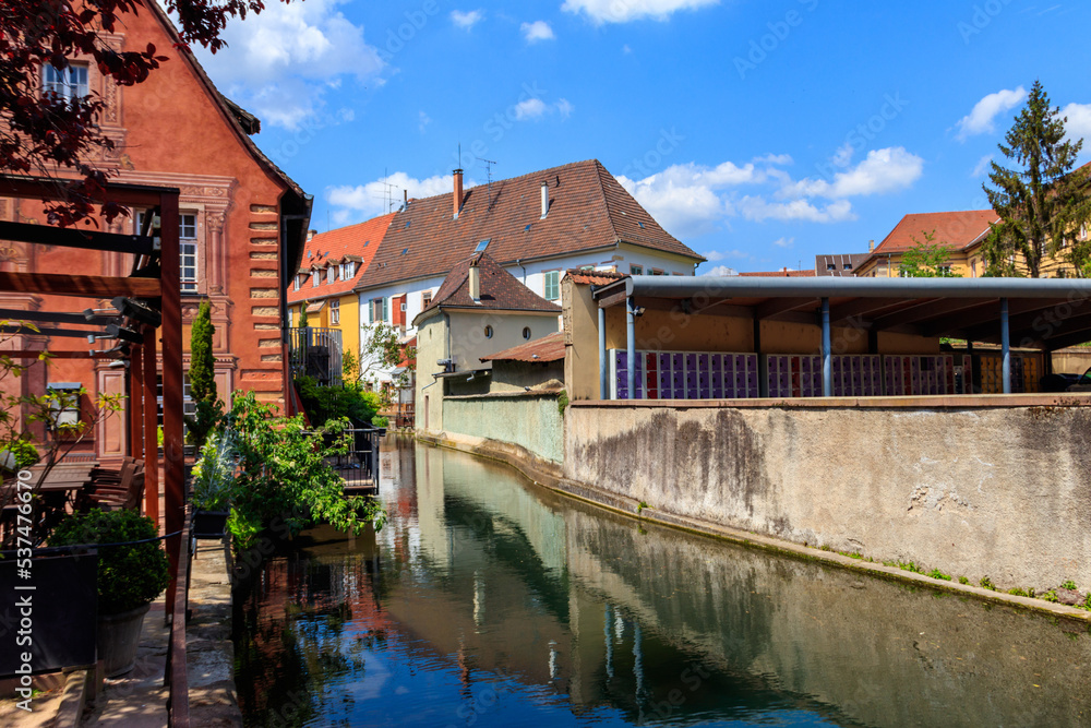 Fototapeta premium Traditional colourful half-timbered houses alongside the Lauch river in Little Venice district in Colmar, Alsace, France