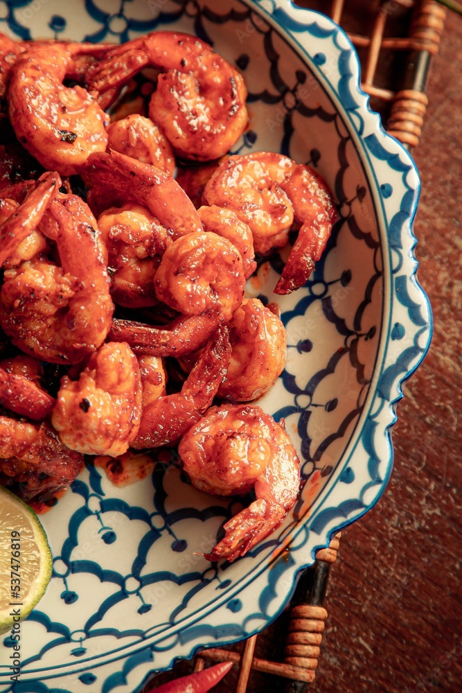 Top view of an oriental dish with roasted shrimp Stock Photo | Adobe Stock