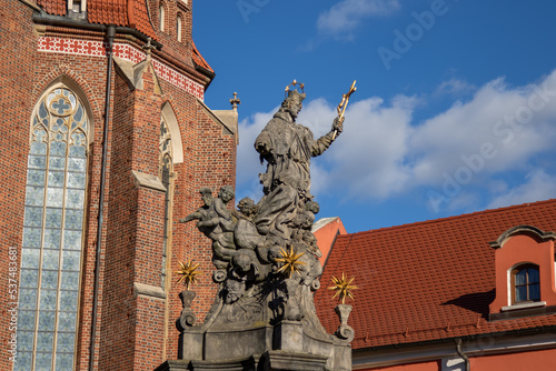 Monument to John of Nepomuk in Wroclaw, representing a saint surrounded by angels and holding a crucifix in his hand. Around the head of St. John is a halo of five stars