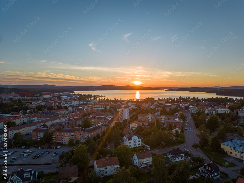 Sunset at a lake and a town in Sweden
