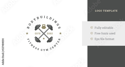 Crossed dumbbells metallic heavy bodybuilding equipment fitness club logo design template vector