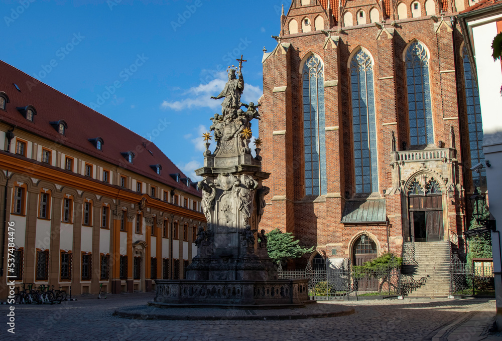 Monument to John of Nepomuk in Wroclaw, representing a saint surrounded by angels and holding a crucifix in his hand. Around the head of St. John is a halo of five stars