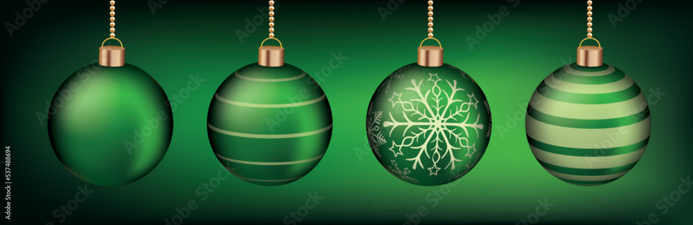 Fototapeta premium Grüne Christbaumkugeln auf grünem Hintergrund