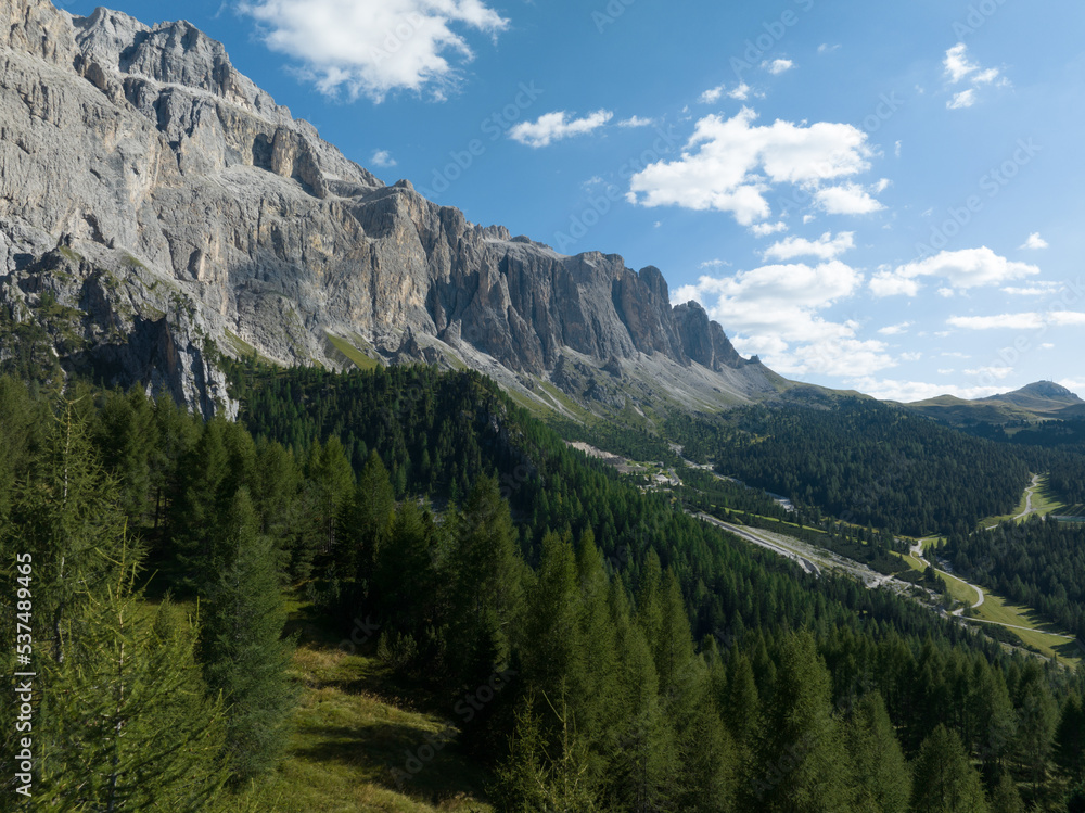 Dolomites Italy mountain range holiday alps landscape clouds aerial cinematic. Mountain aerial drone view. Panorama overhead beautiful landscape.