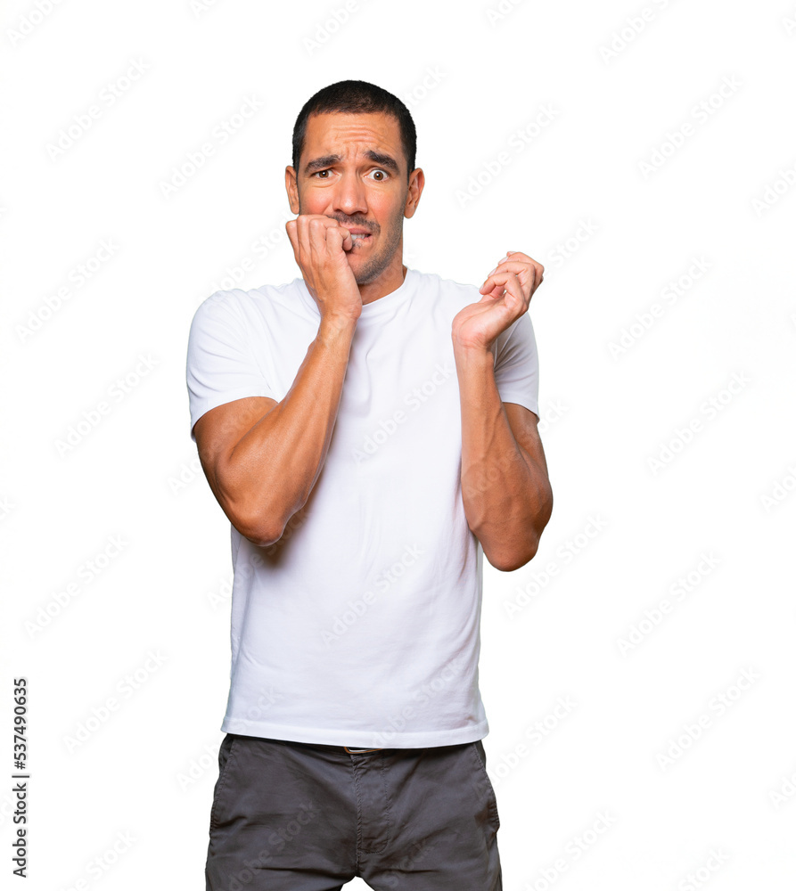 Crazy young man making a nervous gesture Crazy young man making a nervous gesture