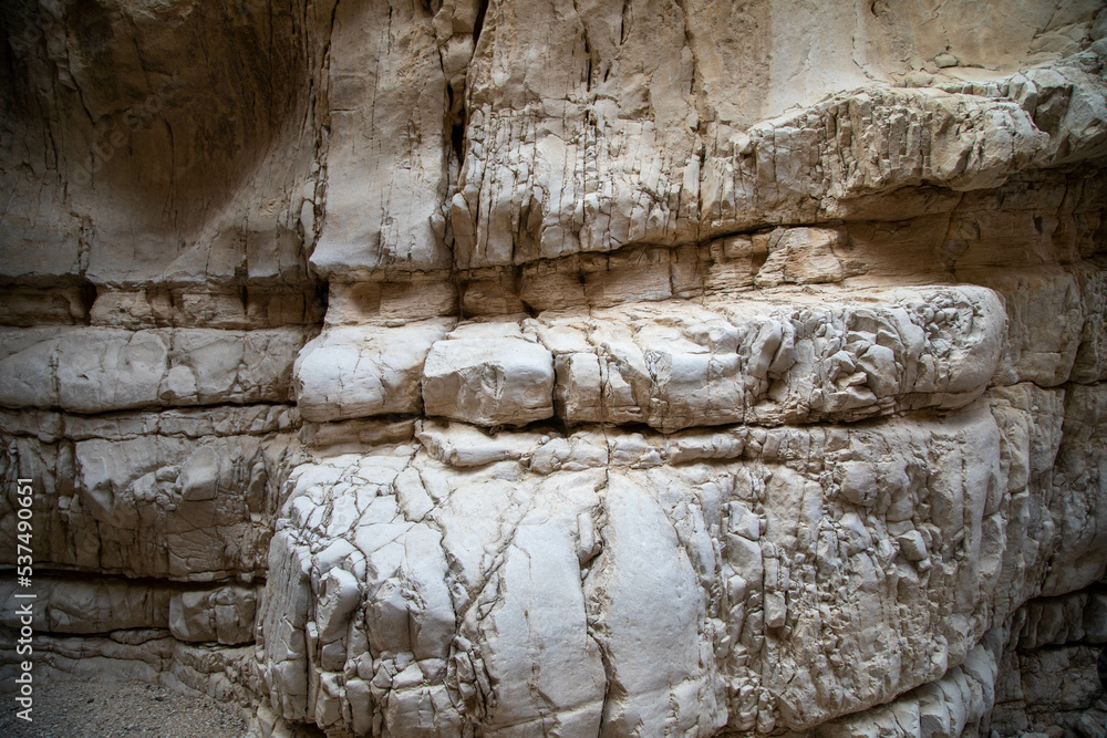 Naklejka premium Abstract nature texture. Rock surface or Beige mountain. Natural material background. Rock climbing backdrop, copy space. High quality photo