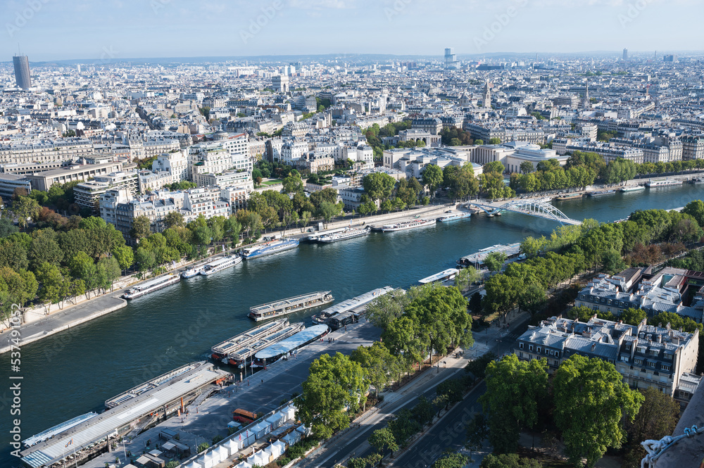 Panoramic view from second floor of Eiffel tower in Paris. View of the buildings, parks with Debilly foot bridge over river Siene