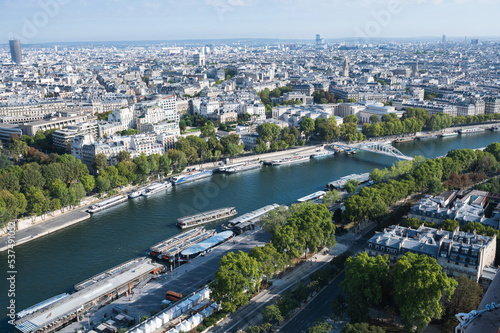 Panoramic view from second floor of Eiffel tower in Paris. View of the buildings  parks with Debilly foot bridge over river Siene